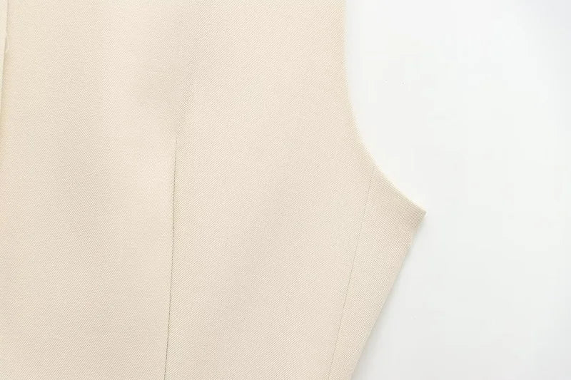 Gilet Sans Manches Ceinturé – Top Boutonné Élégant