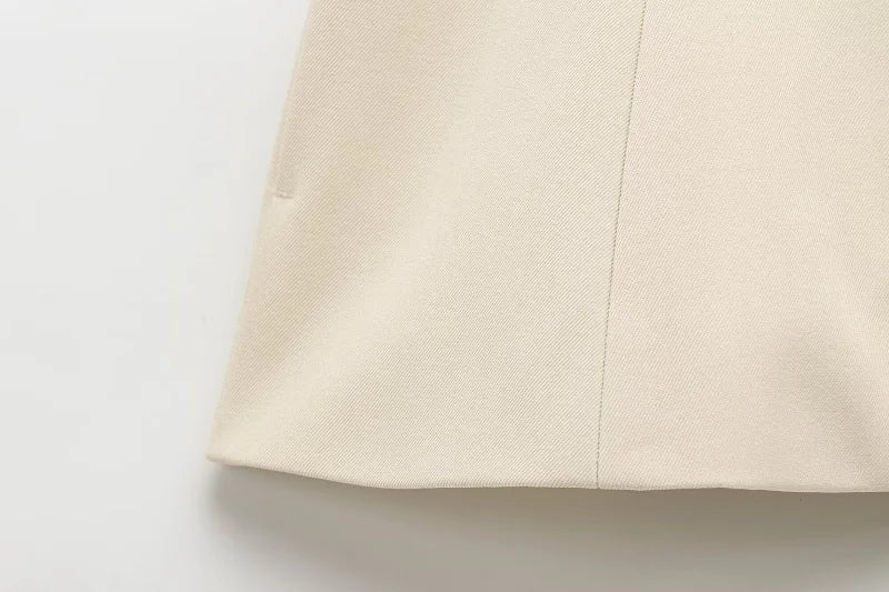 Gilet Sans Manches Ceinturé – Top Boutonné Élégant