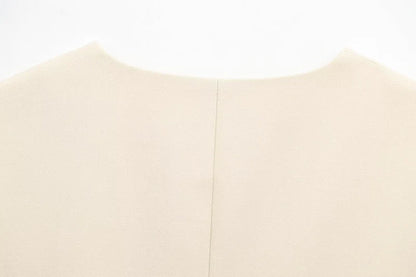Gilet Sans Manches Ceinturé – Top Boutonné Élégant